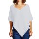Handstickad poncho