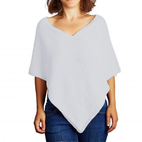Handstickad poncho